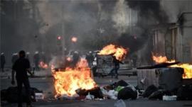 Protesters clash with security forces in the village of Sanabis, west of the capital Manama.