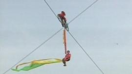 Chinese tightrope performers