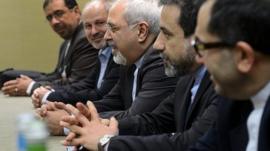 Iranian Foreign Minister Mohammad Javad Zarif, center, attends talks on Iran