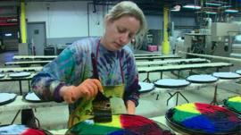 A worker at a factory in the US which is doing well financially