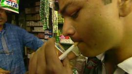 Man lighting a cigarette