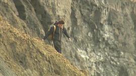 Man near cliffs in Dorset