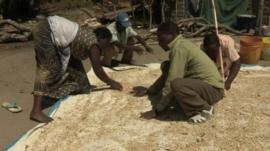 Tanzanians with crops