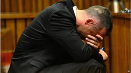 Oscar Pistorius holds head in hands in court on May 5 2014