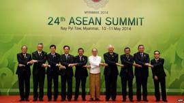 Leaders join hands for photo at ASEAN summit