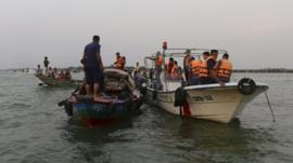 Resucers look for bodies of passengers from M.V. Miraj-4 ferry