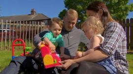 Jason Nish with his partner and children