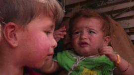 Displaced children fleeing Irbil, Iraq