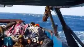Migrants on boat on Mediterranean