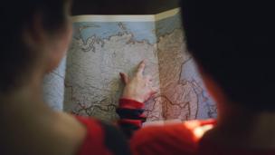 People looking at a map