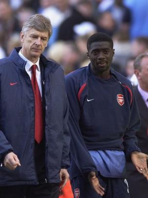 Meneja wa Arsenal Arsene Wenger na Kolo Toure