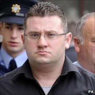 <b>Declan Duffy</b> being led into a Dublin court in 2008 - _48448796_009705664-1