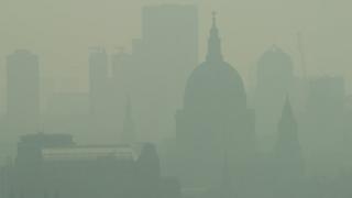 Mist and pollution hang over the London skyline