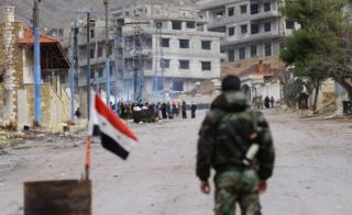 Syrian government forces on the outskirts of besieged rebel-held Syrian town of Madaya (14 January 2016)