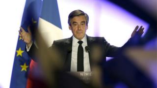 Conservative presidential candidate Francois Fillon gestures as he delivers his speech in Nimes, Thursday, March 2, 2017.