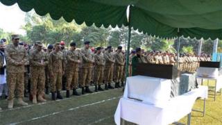 Pakistani army chief Raheel Sharif (4L) and military officials offer funeral prayers for soldiers who were killed in cross-border firing at the Line of Control (LoC) in Bhimber sector, in Jhelum some 120 kms south of Islamabad.