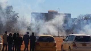 tear gas rises above freedom square in Harare