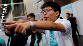 Joshua Wong celebrating after Hong Kong's legislative council elections