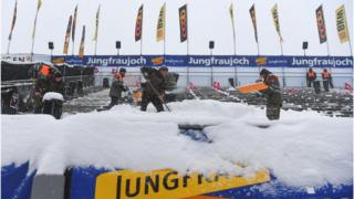 Staff purify a tribune during a finish area of a men's Alpine downhill competition of a FIS Alpine Skiing World Cup during a Lauberhorn, in Wengen, on 14 Jan 2017.