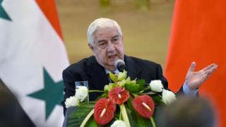 Syrian Foreign Minister Walid Muallem speaks to reporters in Beijing (24 December 2015)