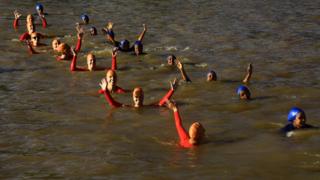 Sudanese and Dutch women take part in an event to swim across the Blue Nile as part of an event organised by Dutch ambassador in Sudan in conjunction with charities that raise awareness against drowning and teach people safe swimming, Khartoum, Sudan - Saturday 26 November 2016