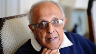 This file photo taken on July 16, 2012 shows Ahmed Kathrada, anti-apartheid activist and close friend of former South African President Nelson Mandela poses in his house in Johannesburg. Kathrada was sentenced with Mandela to life imprisonment on June 12, 1964