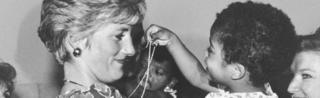 Princess Diana with an HIV positive child in Brazil in 1991