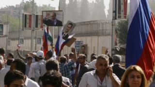 Crowd outside Russian embassy just before missiles strike. 13 Oct 2015