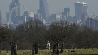 Cyclist in London park