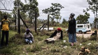 Elderly South African women wait outside a Social Grant distribution center at Ngudwini, KwaZulu Natal province on the outskirts ot Eshowe, South Africa, on November 7, 2014