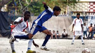 Players in the final match of the league