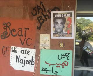 Posters showing campaigns to help the police find Najeeb Ahmed