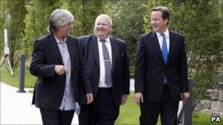Phil Redmond, Eric Pickles communities minister and David Cameron before the 'big society' speech