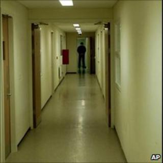 Corridor with guard at Yarl's Wood detention centre in Bedford