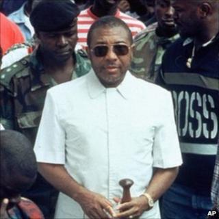 Charles Taylor surrounded by his troops in Liberia