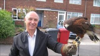 Graham Mitchell, from the council, with George the falcon