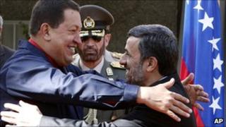 President Chavez embraces President Ahmadinejad in Tehran