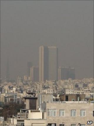 Rooftops are seen shrouded in polluted air in Tehran Wednesday, Dec 1, 2010
