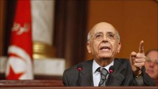 Tunisia's Prime Minister Mohammed Ghannouchi speaks at the National Assembly in Tunis on 7 February 2011