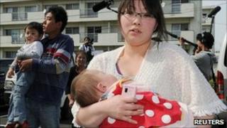 A woman evacuee from Iitate village at a evacuation centre about 40 km (24 miles) from Daiichi nuclear power plant