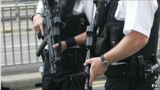 Armed policemen at Heathrow Airport