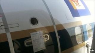 The seal of a bailiff on the door of a grounded Boeing 737 of the Royal Thai Air Force at the airport in Munich