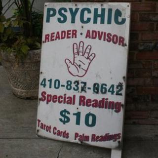 street sign for psychic reader