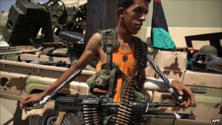 Rebel fighter near Bab al-Aziziya compound, Tripoli - 24 August 201
