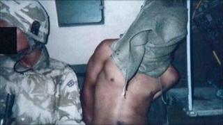 A hooded detainee in Iraq. Copyright: Baha Mousa inquiry