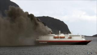 Smoke rising from the Norwegian cruise ship, the Nordlys