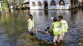 Pakistani medics in flood water in Sindh province, October 2011