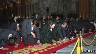 North Koreans mourn their leader in Pyongyang on 21 December 2011