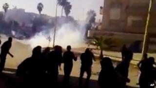 Unverified video image said to show violence at a protest in Hama on Thursday