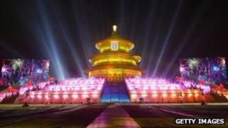 The Temple of Heaven in Beijing is illuminated as the Chinese capital celebrates New Year's Eve, 31 December 2011